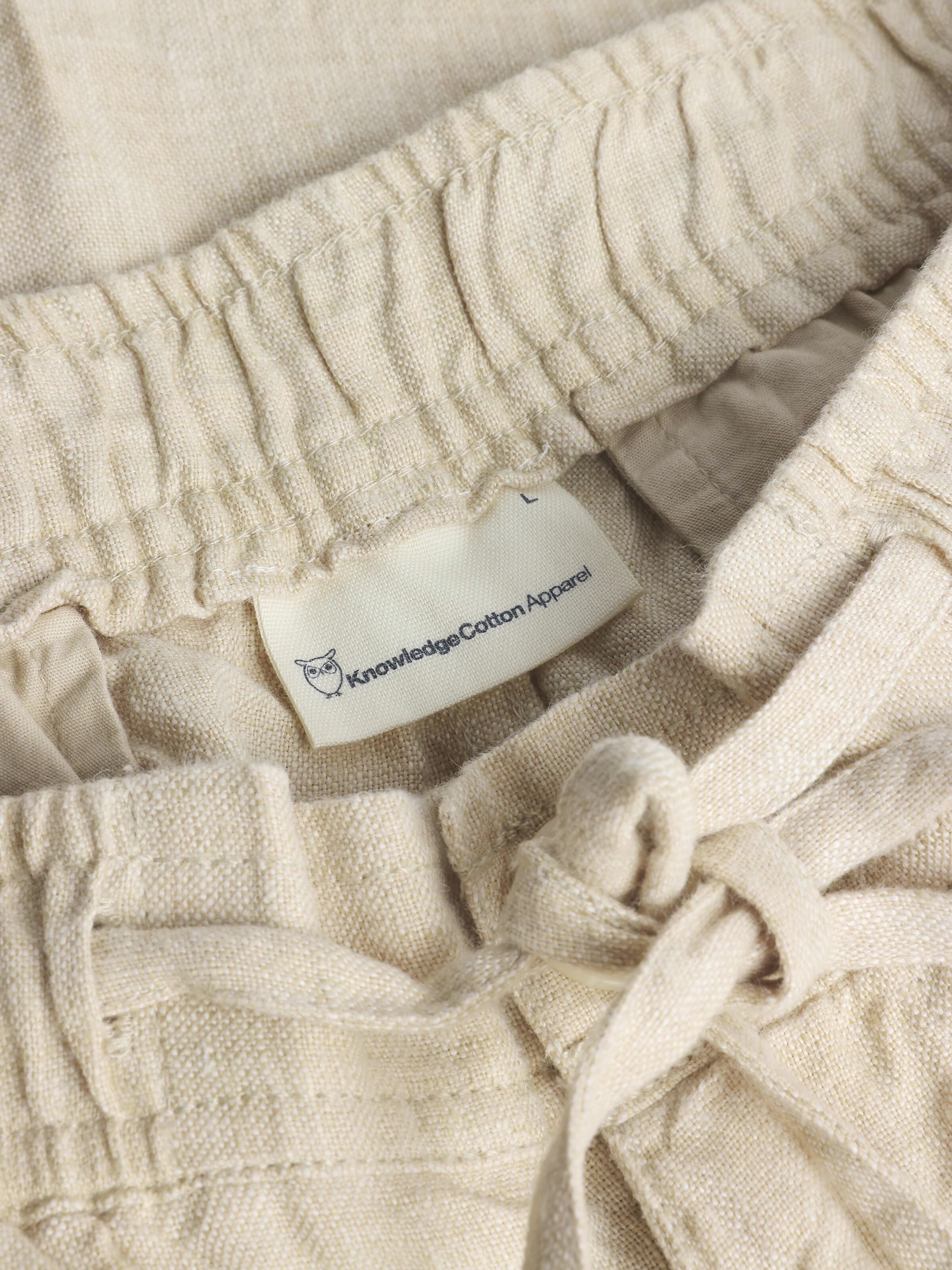 knowledge cotton apparel homme short fig loose lin bio beige l armoire poethique 1