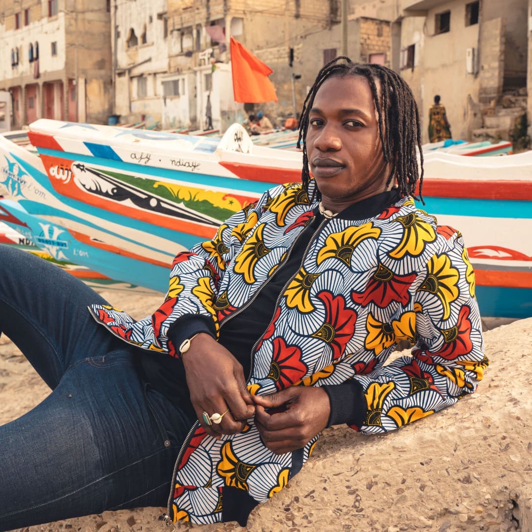 Loumpoul reversible cotton and cotton wax bomber jacket · red, yellow and navy blue