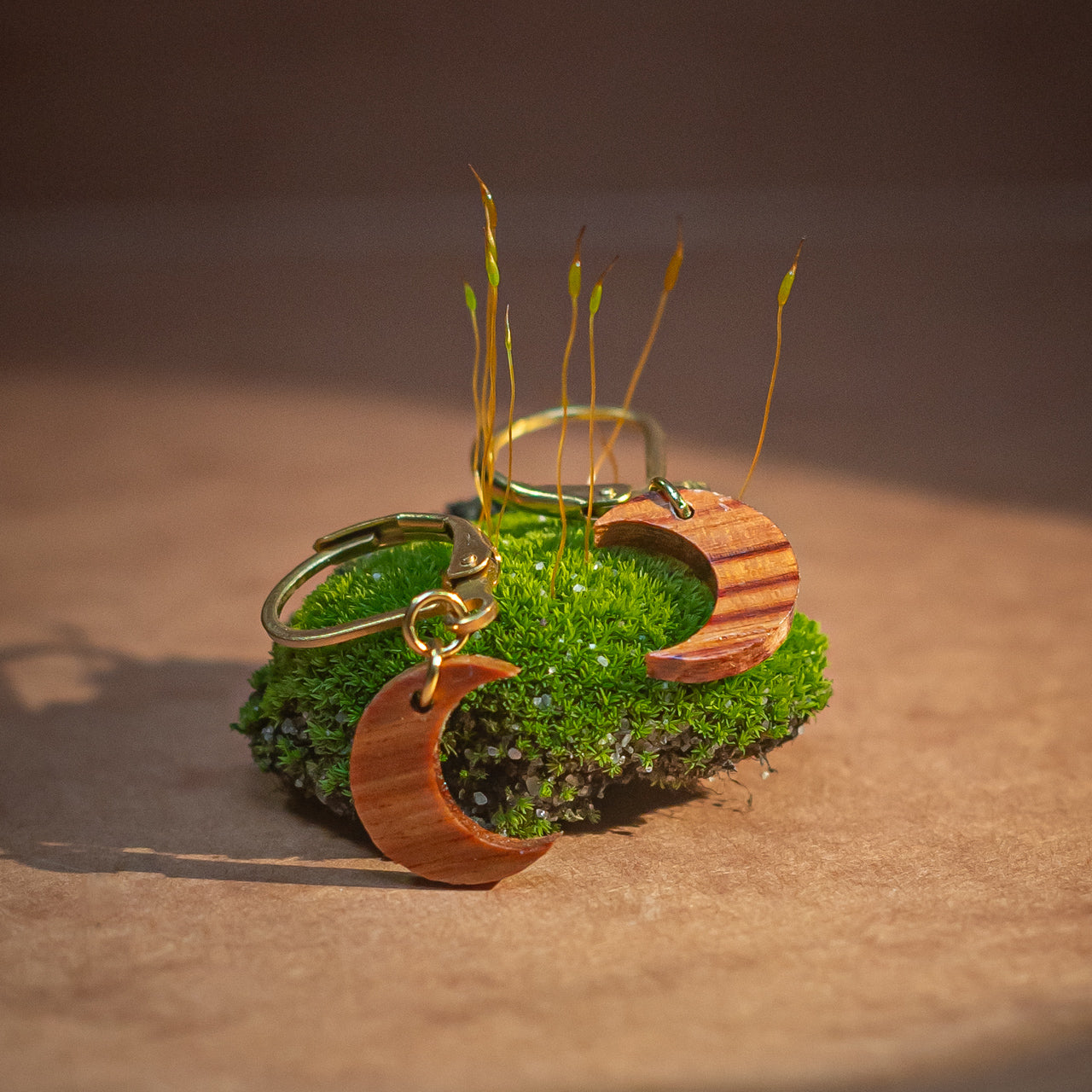 Half-moon sleeper earrings in precious wood scraps · gold